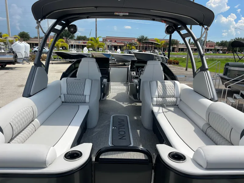 Slide: The Image of 2026 Avalon 2585 Catalina Windshield Quad Lounger with luxurious seating and high-performance Mercury 400hp V-10 motor. - 9