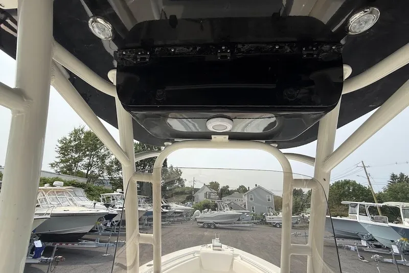 Slide: The Image of 2026 Key West 239 FS boat interior view with overhead console and surrounding boats. - 15