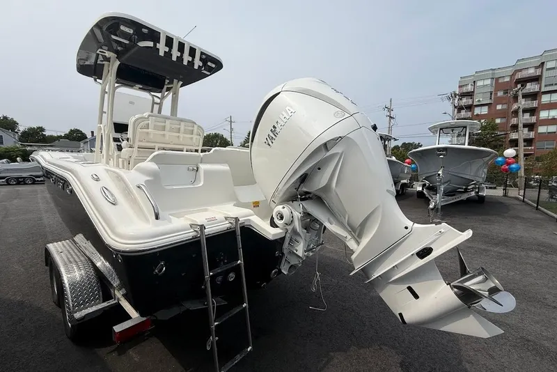 Slide: The Image of 2026 Key West 239 FS boat with Yamaha outboard motor on a trailer. - 16