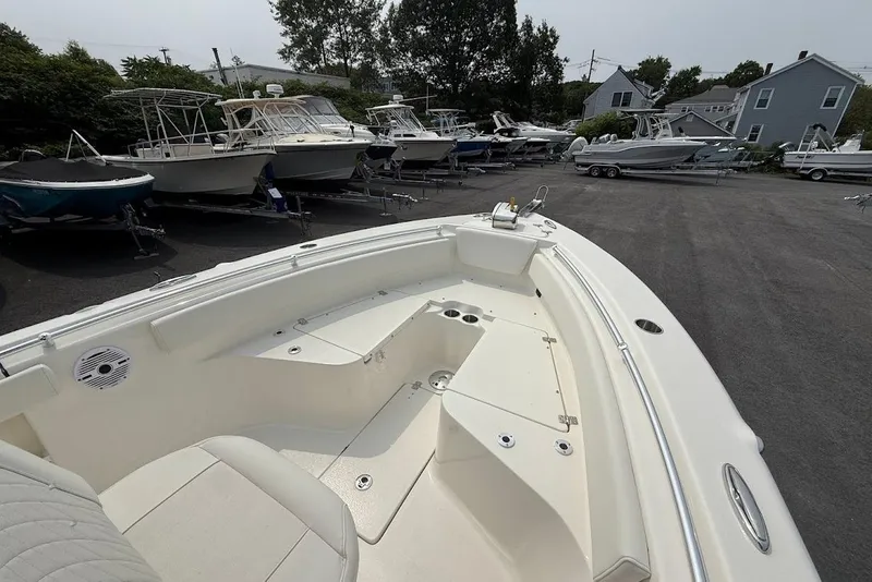 Slide: The Image of 2026 Key West 239 FS boat in a marina with other boats. - 19