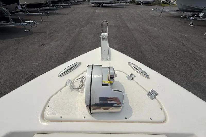 Slide: The Image of Bow view of 2026 Key West 239 FS boat with anchor winch and cleats. - 4