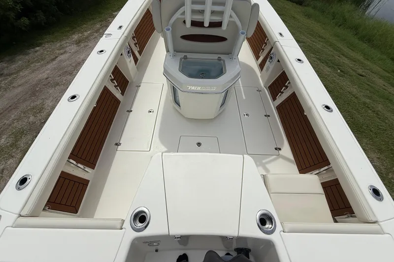 Slide: The Image of 2026 Pathfinder 2700 Open boat interior with seating and storage compartments. - 11