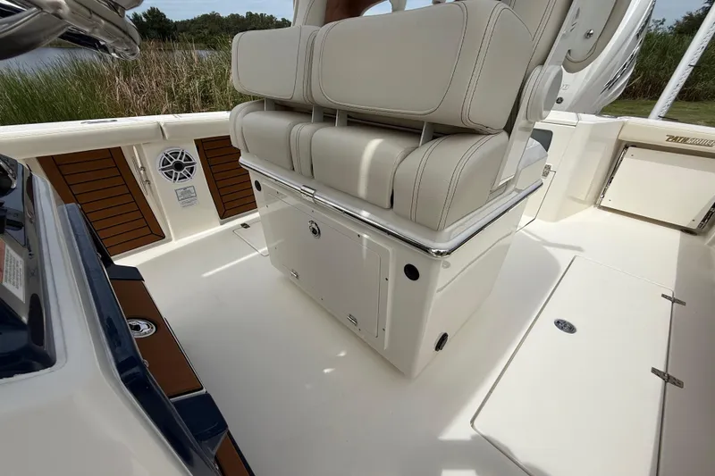 Slide: The Image of 2026 Pathfinder 2700 Open boat interior with cushioned seating and storage compartments. - 33