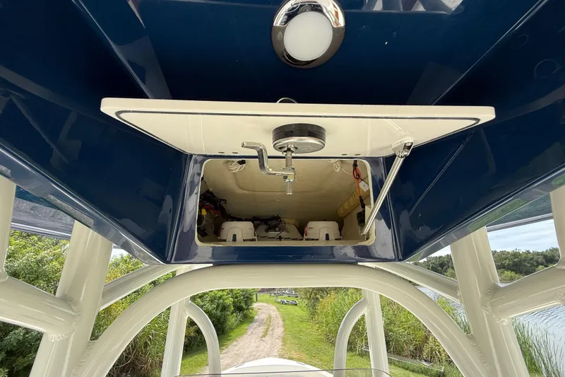 Slide: The Image of 2026 Pathfinder 2700 Open boat, showcasing storage compartment and sleek design. - 38