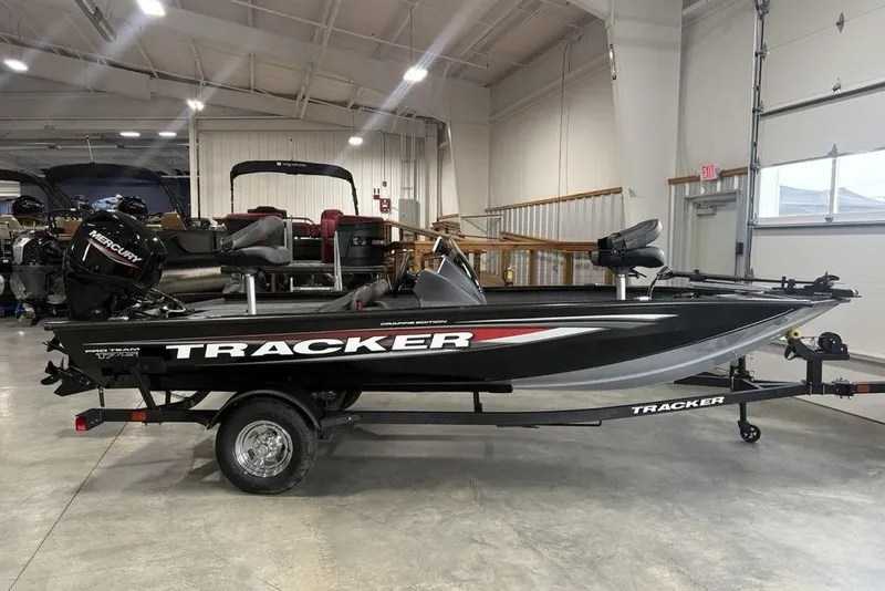 The Image of 2026 Tracker Pro Team 175 Crappie Edition boat in showroom, side view. - 0