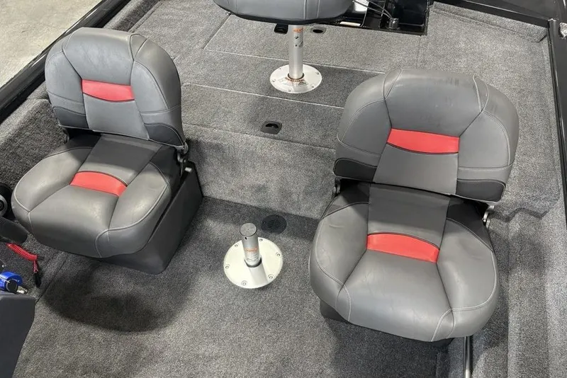 Slide: The Image of 2026 Tracker Pro Team 175 Crappie Edition boat interior with gray and red seats. - 15