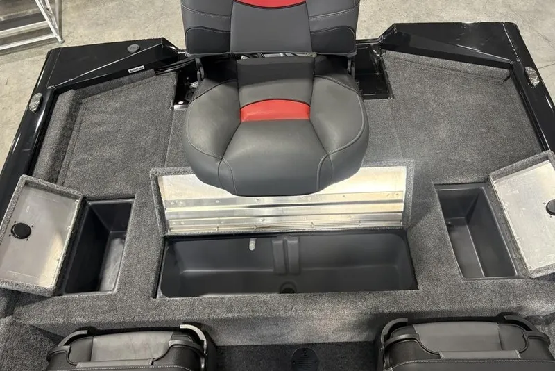 Slide: The Image of 2026 Tracker Pro Team 175 Crappie Edition boat interior with seating and storage compartments. - 21