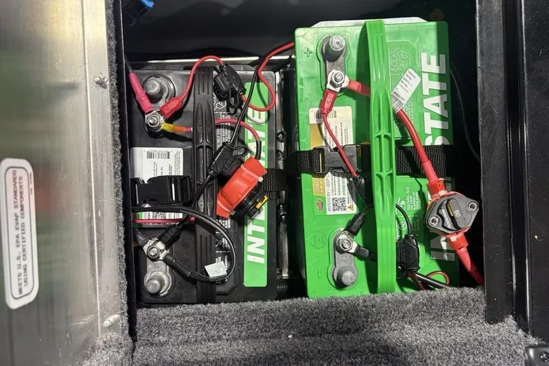 Slide: The Image of Batteries in a 2026 Tracker Pro Team 175 Crappie Edition boat, featuring Interstate branding. - 24