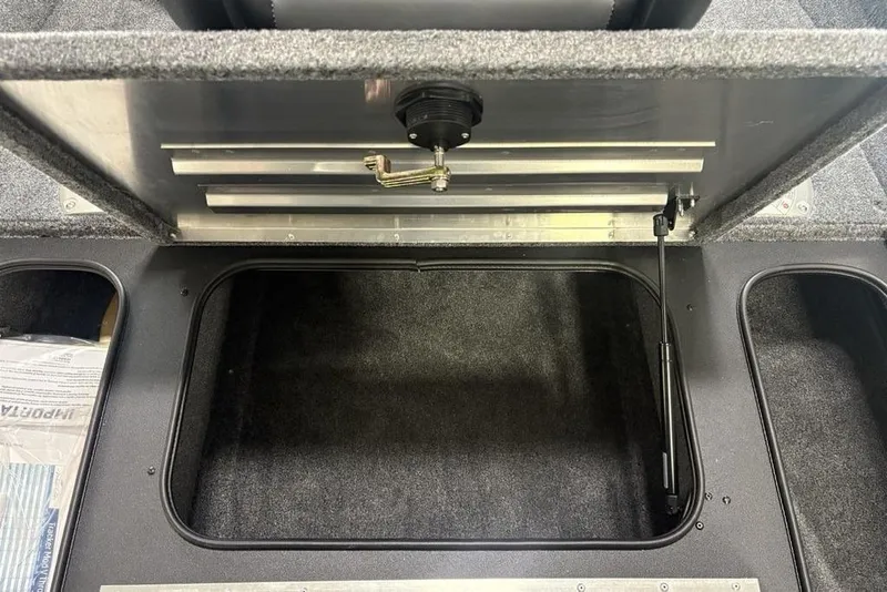 Slide: The Image of Open storage compartment in 2026 Tracker Pro Team 175 Crappie Edition boat. - 4