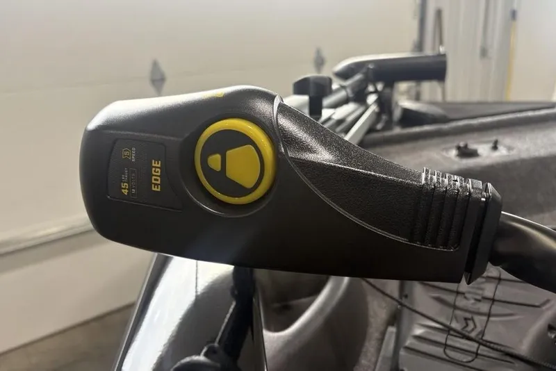 Slide: The Image of Close-up of a 2026 Tracker Pro Team 175 Crappie Edition boat control handle. - 9