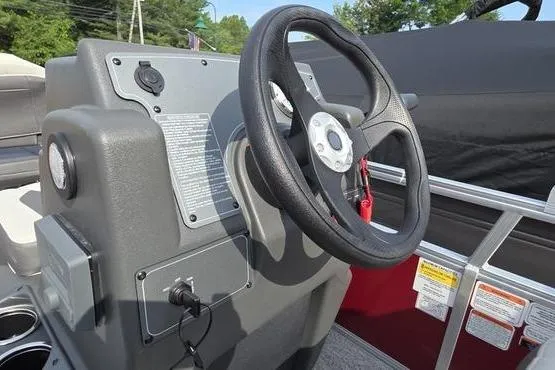 Slide: The Image of Steering console of 2026 Sun Tracker BB 18 DLX boat with control panel. - 11