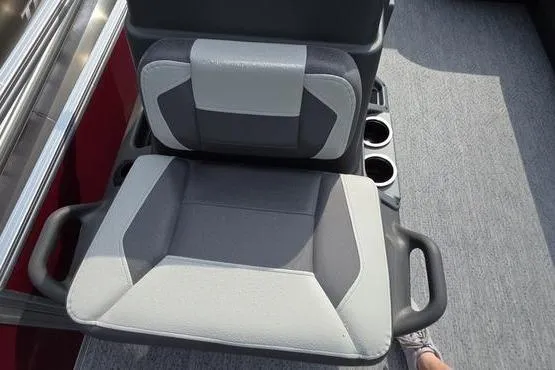 Slide: The Image of 2026 Sun Tracker BB 18 DLX boat seat with cup holders, featuring gray and black upholstery. - 14
