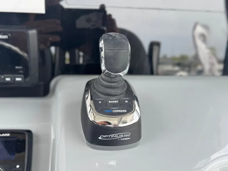 Slide: The Image of Joystick control on 2026 Sea Pro 292 DLX boat dashboard, featuring Optimus 360 system. - 11