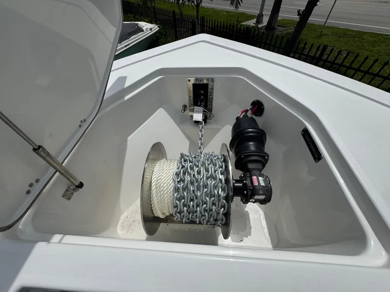 Slide: The Image of Anchor locker of 2026 Sea Pro 292 DLX boat with chain and rope. - 36