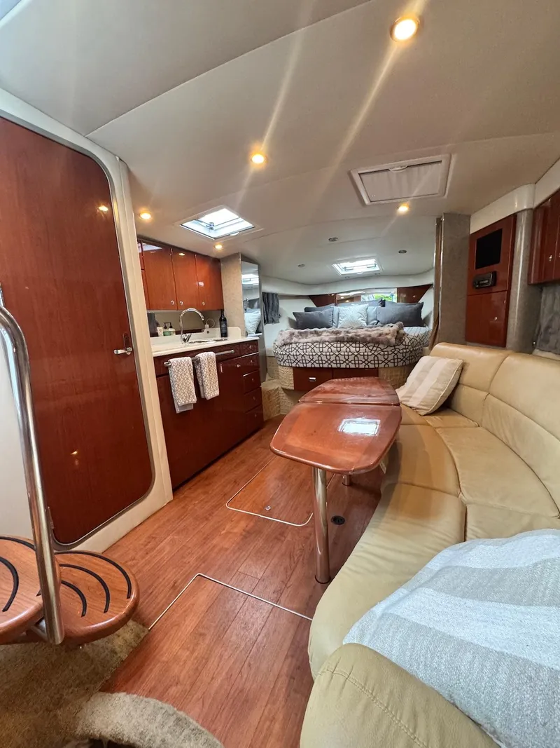 Slide: The Image of Luxurious interior of a 2008 Formula 34 PC yacht with cozy seating and modern amenities. - 16