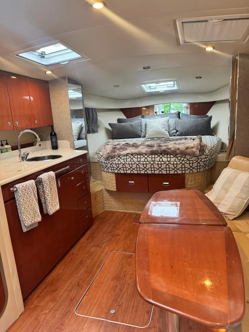 Slide: The Image of Luxurious interior of a 2008 Formula 34 PC yacht with cozy bed and kitchenette. - 17