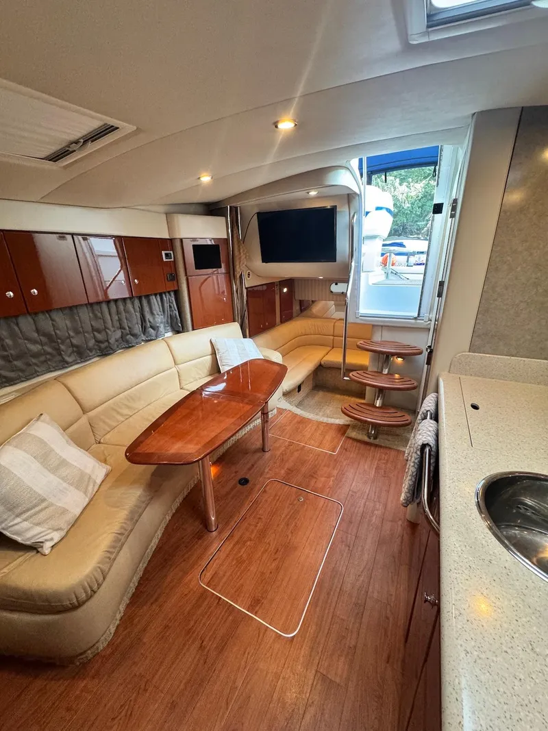 Slide: The Image of Luxurious interior of a 2008 Formula 34 PC yacht with elegant seating and modern amenities. - 18