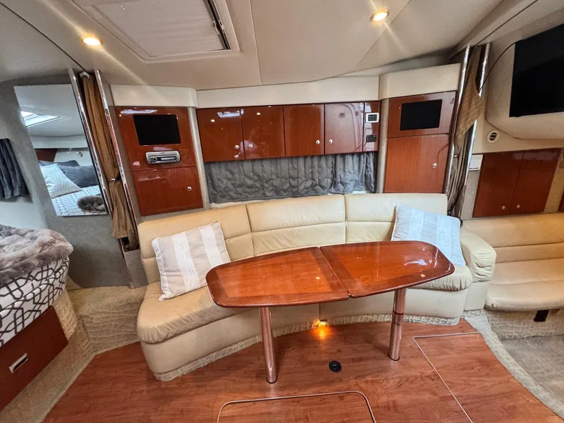 Slide: The Image of Luxurious interior of a 2008 Formula 34 PC yacht with elegant wood finishes. - 20