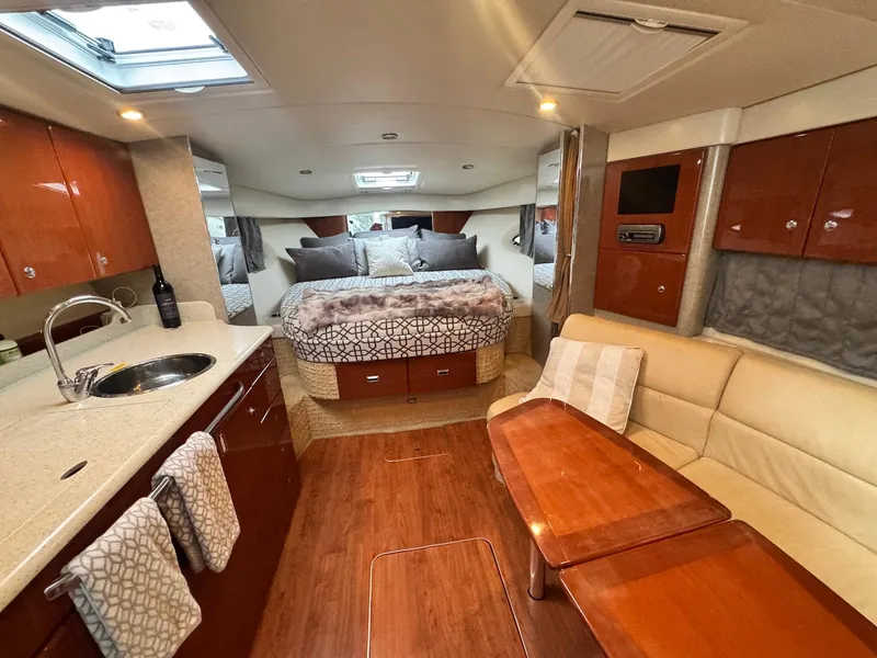 Slide: The Image of Luxurious interior of a 2008 Formula 34 PC yacht with cozy seating and modern amenities. - 22