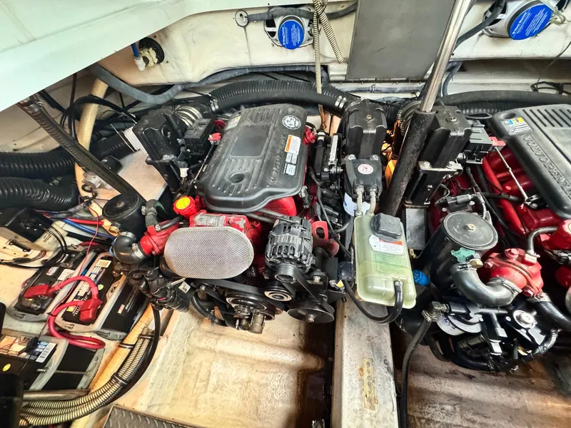 Slide: The Image of Engine compartment of a 2008 Formula 34 PC boat, showcasing detailed mechanical components. - 29