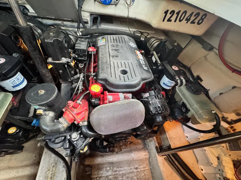 Slide: The Image of Engine compartment of a 2008 Formula 34 PC boat, showcasing detailed mechanical components. - 30