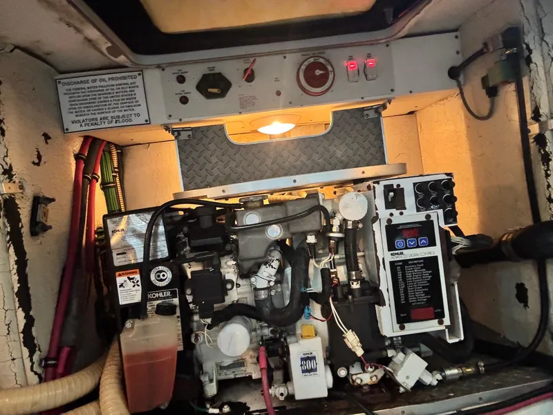 Slide: The Image of Engine compartment of a 2008 Formula 34 PC boat with Kohler generator. - 32
