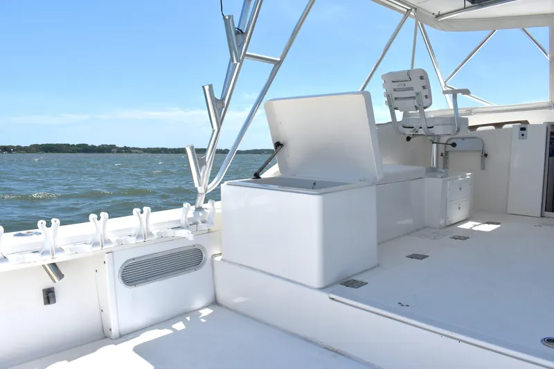 Slide: The Image of 2004 Judge 34 Express boat interior with open seating and ocean view. - 12