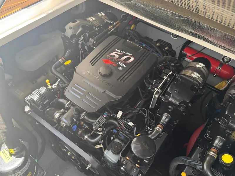 Slide: The Image of Engine compartment of a 2004 Sea Ray 280 Sundancer with MerCruiser 5.0 MPI engine. - 27