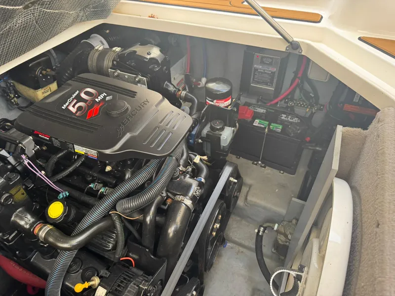 Slide: The Image of Engine compartment of a 2004 Sea Ray 280 Sundancer with MerCruiser 5.0 MPI engine. - 31