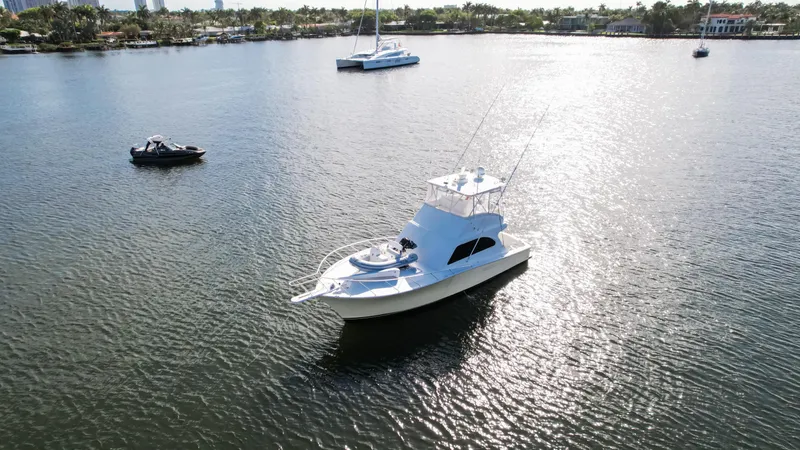 Slide: The Image of Aerial view of 2008 Post 42 yacht on calm water with other boats nearby. - 17