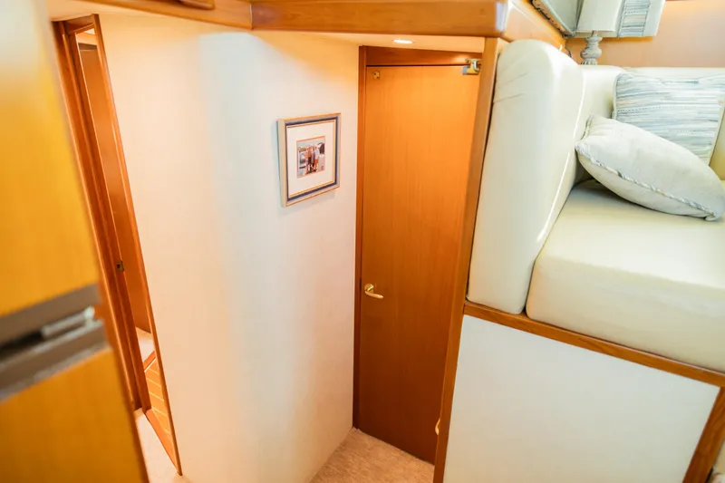 Slide: The Image of Interior of 2008 Post 42 yacht with cozy cabin and wooden door. - 40