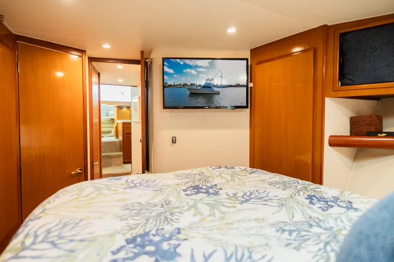 Slide: The Image of Luxurious cabin interior of 2008 Post 42 yacht with TV and wooden finishes. - 44