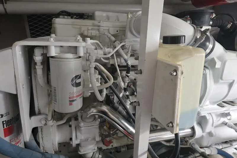 Slide: The Image of Close-up of a 2008 Post 42 engine with visible filters and components. - 49