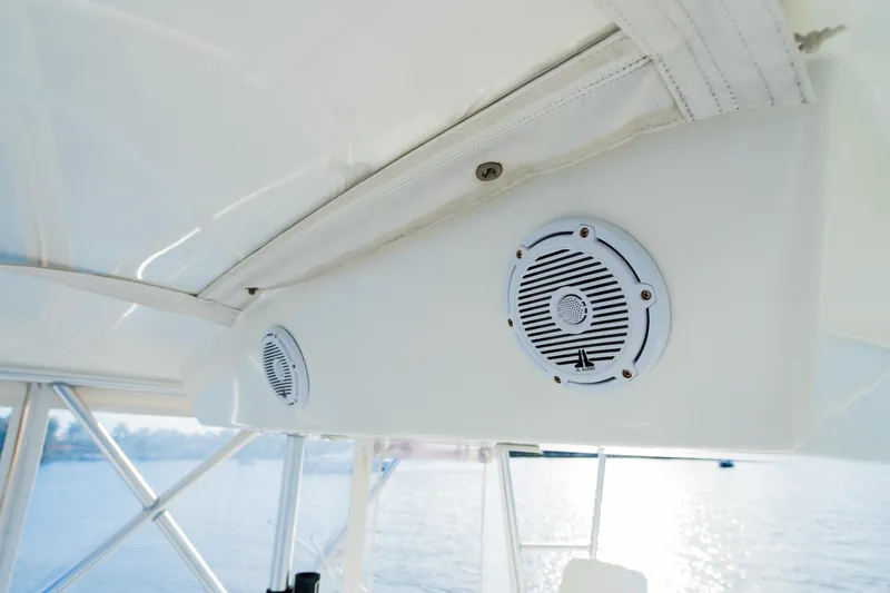 Slide: The Image of Boat interior with mounted speakers, Post 42 model, 2008, overlooking water. - 29