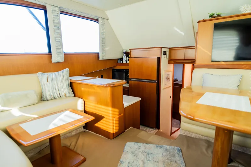 Slide: The Image of Luxurious 2008 Post 42 yacht interior with elegant wood finishes and comfortable seating. - 33
