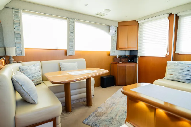 Slide: The Image of Luxurious interior of a 2008 Post 42 yacht with elegant seating and wooden accents. - 34