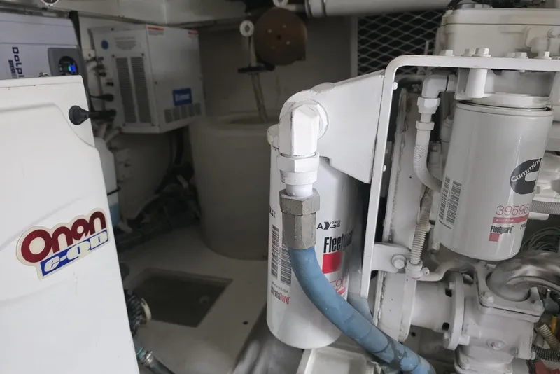 Slide: The Image of Engine room with Onan generator and Fleetguard filters, Post model 42, 2008. - 50