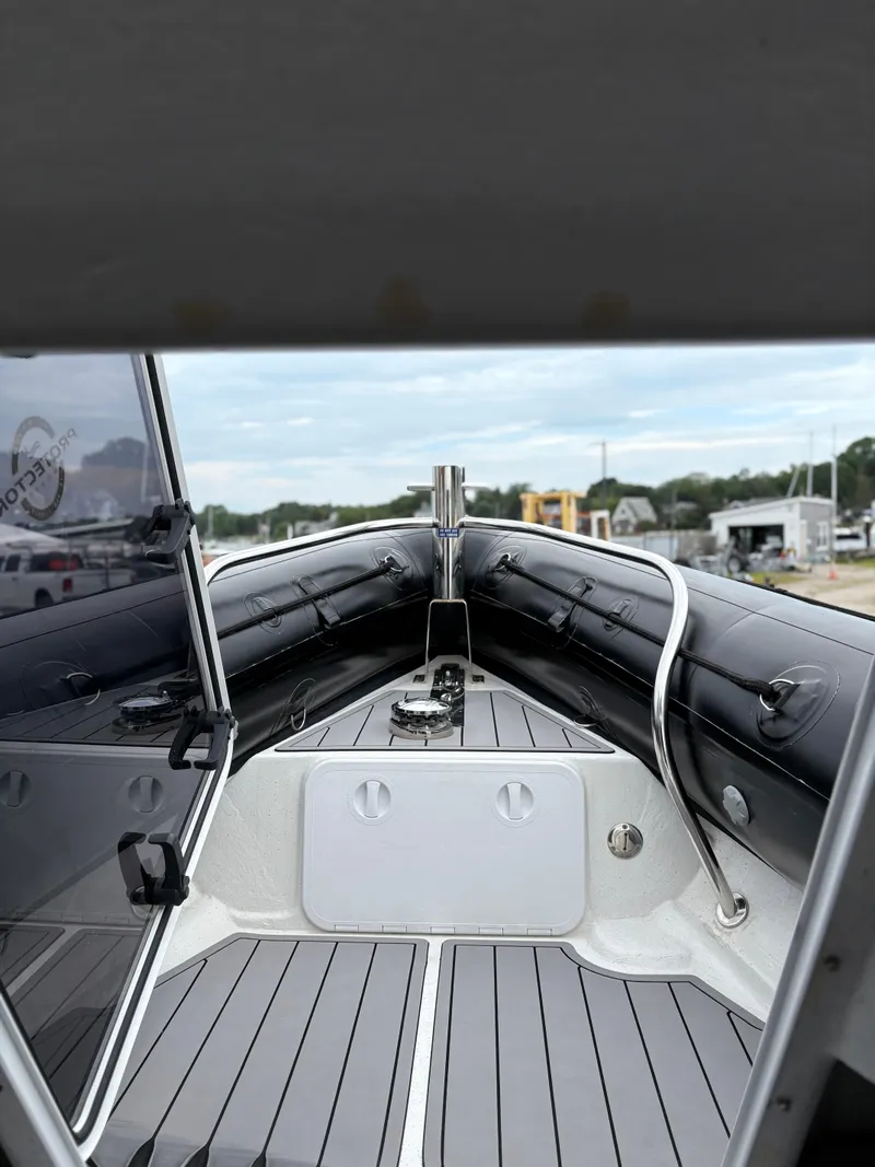 Slide: The Image of 2020 Protector 310 Targa boat interior with sleek design and modern features. - 10