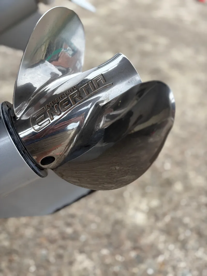 Slide: The Image of Close-up of a Mercury Enertia propeller on a 2020 Protector 310 Targa boat. - 18