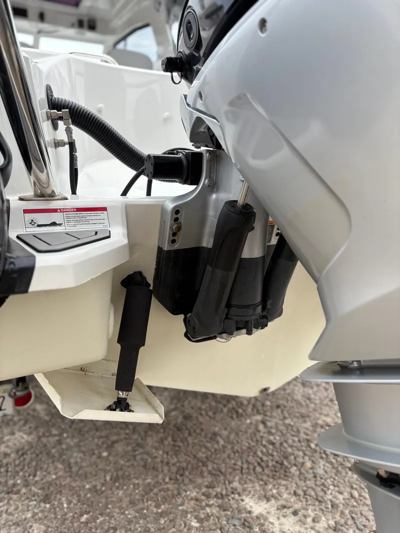 Slide: The Image of Close-up of a 2020 Protector 310 Targa boat engine and hydraulic system. - 20