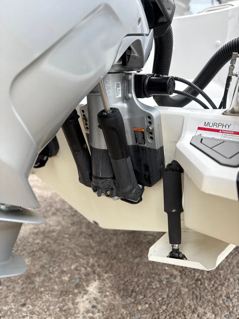 Slide: The Image of Close-up of a 2020 Protector 310 Targa boat engine components. - 21