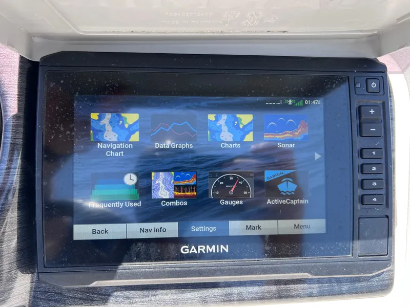 Slide: The Image of Garmin marine display on 2022 Tahoe Pontoon LTZ 2485 EL, showing navigation and sonar options. - 30