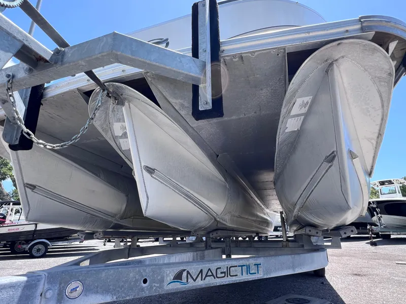 Slide: The Image of 2022 Tahoe Pontoon LTZ 2485 EL on Magic Tilt trailer, viewed from below. - 8