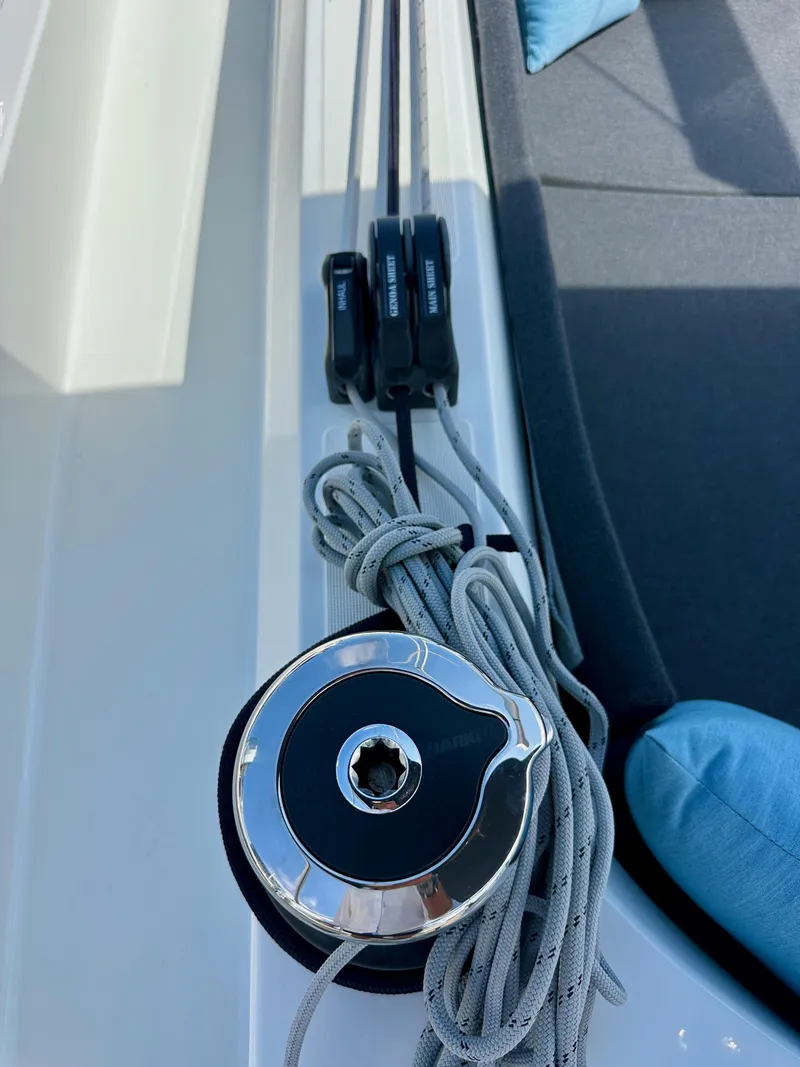 Slide: The Image of Close-up of Jeanneau Sun Odyssey 410 sailboat winch and ropes, 2024 model. - 18
