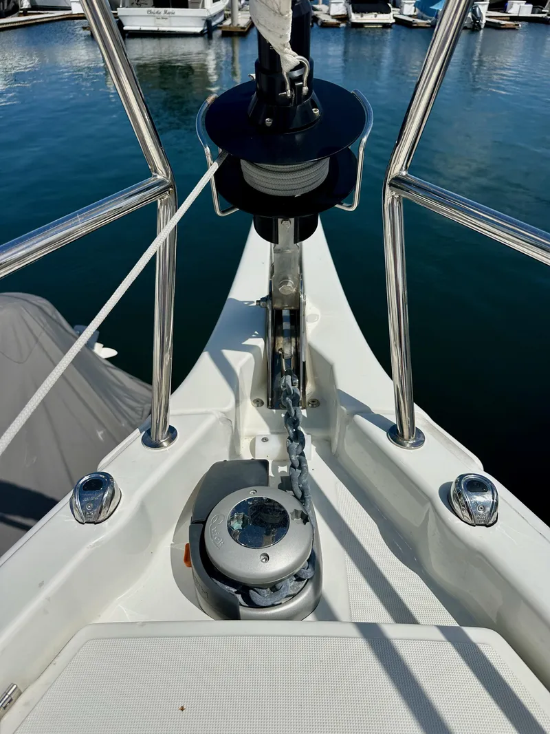 Slide: The Image of Bow of 2024 Jeanneau Sun Odyssey 410 with anchor chain and winch system. - 33