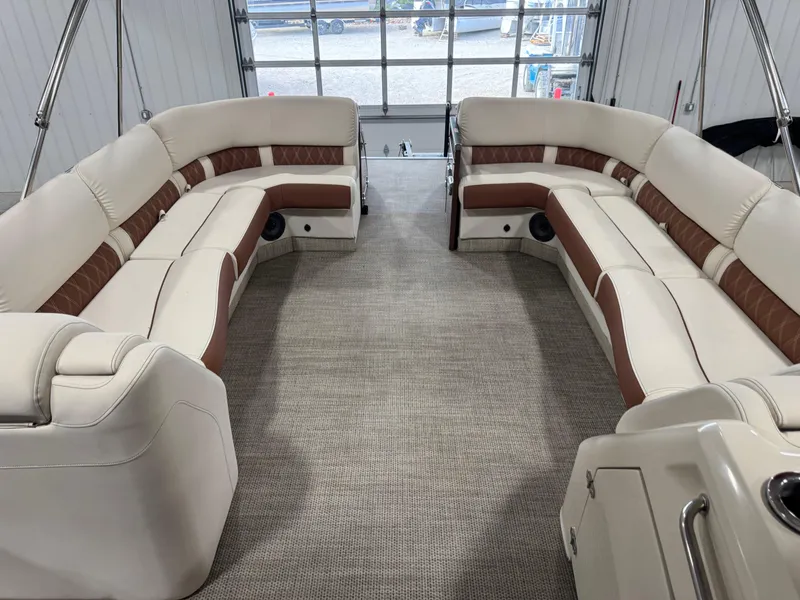 Slide: The Image of Luxurious interior of 2022 Bennington QX 30 pontoon boat with plush seating. - 10
