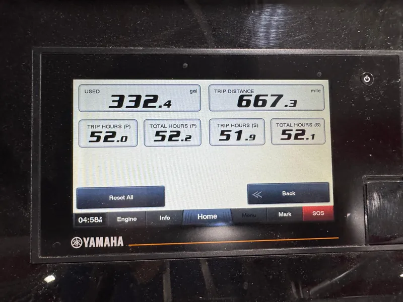 Slide: The Image of Yamaha display showing fuel usage and trip data for 2022 Bennington QX 30. - 13