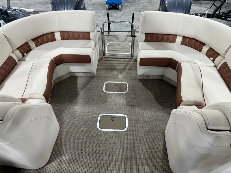 Slide: The Image of Luxurious interior of 2022 Bennington QX 30 pontoon boat with plush seating. - 8