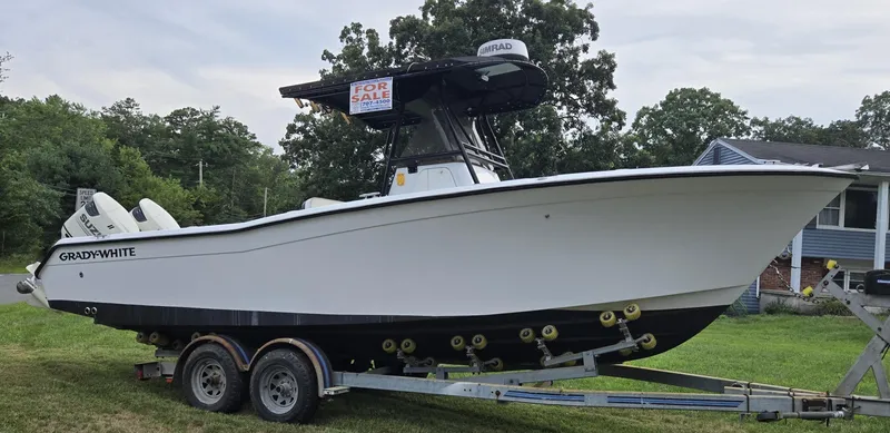 The Image of 1994 Grady-White Chase 263 boat on trailer, for sale sign visible. - 0