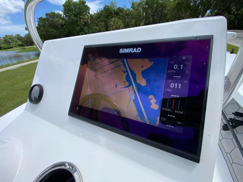 Slide: The Image of Simrad navigation display on 2020 East Cape 18 EVO boat, showing map and data. - 39